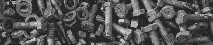 Bolt, nut and washer collection on table